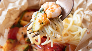 Spaghetti mit Shrimps in Pergament